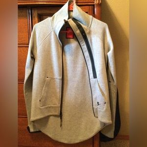 NIKE zip gray w/ light green streaks.  Hi lo cut. Perfect condition.